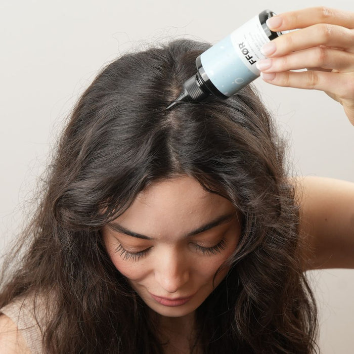 FFOR Purify:Scalp Serum being applied to scalp