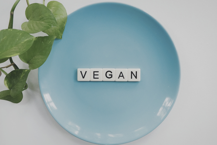 FFOR Hair Banner image of blue plate and vegan sign