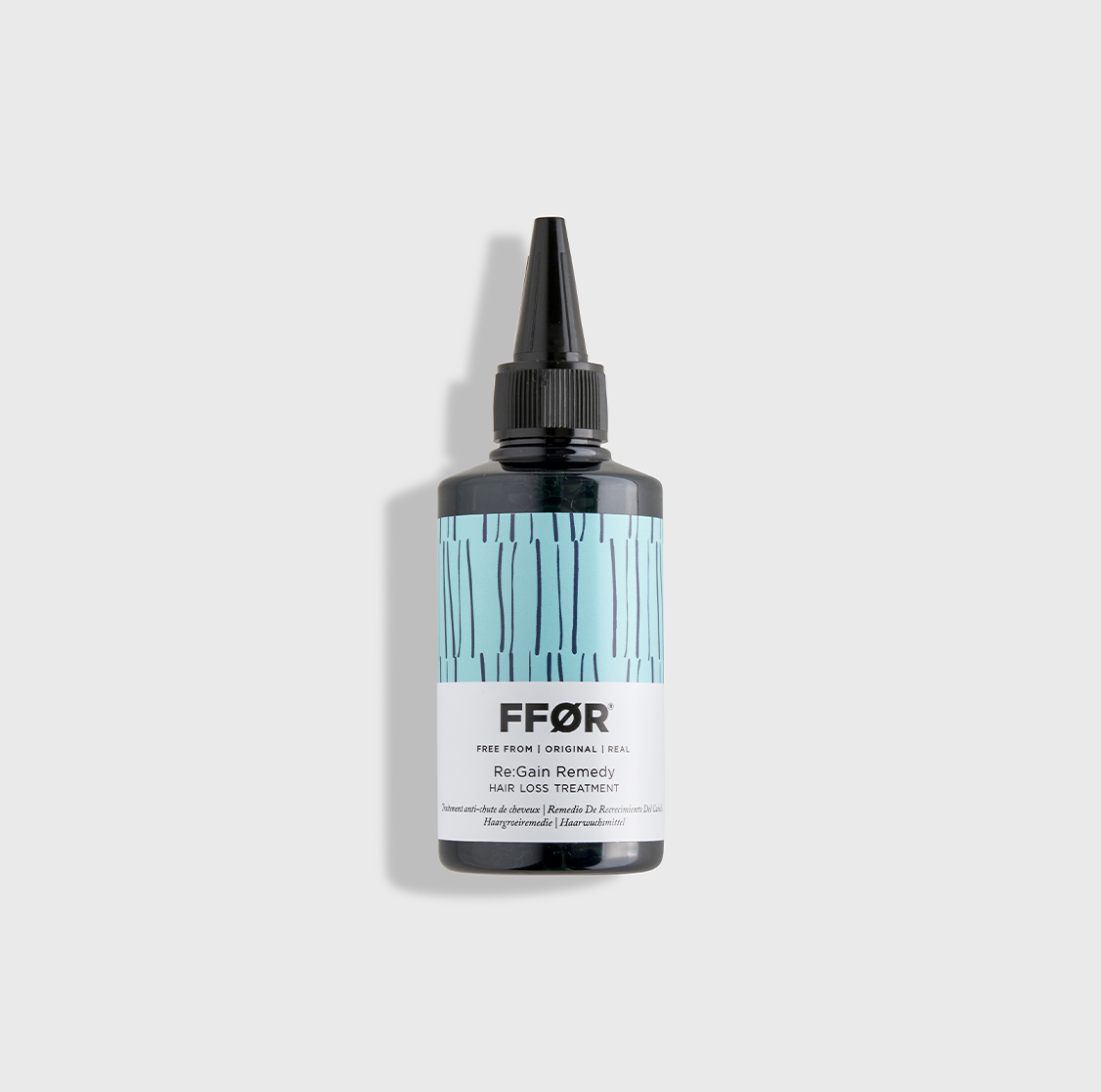 FFOR Hair regain remedy hair loss treatment bottle image  on plain backdrop