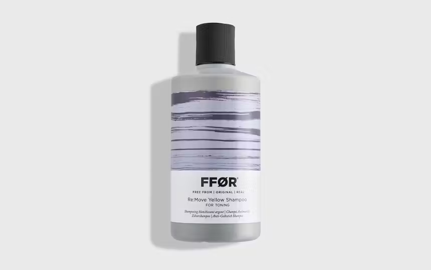 FFOR Hair remove yellow purple toning shampoo bottle on plain background